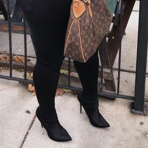 Stretchy thigh high heels